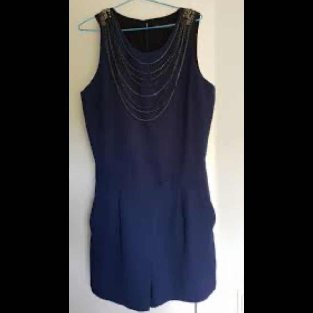 Elegant Navy Sleeveless Dress with Chain Detail